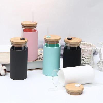 China Wholesale Custom Viable Glass Water Bottle Bamboo Lid Borosilicate Glass Drinking Bottle With Silicone Sleeve for sale