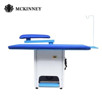 China Factory price steam vacuum table commercial laundry ironing table with steam generator 1400*900*1000mm en venta