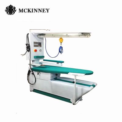 China High Efficiency Industrial Clothes Steam Iron Press Commercial Laundry Ironing Table For Sale en venta