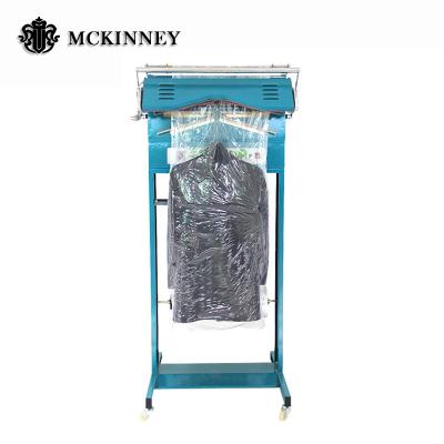 China Garment Packing Good Price Commercial Laundry Shop Clothes Garment Packing Machine en venta