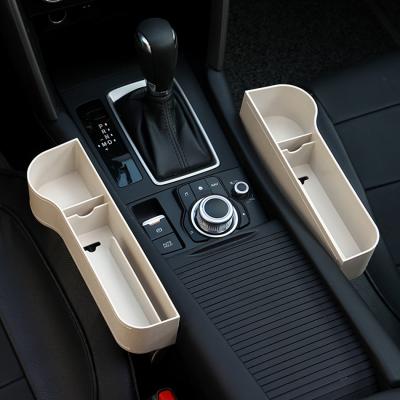 China Save Space Multifunctional Slot Socket Car Slot Storage Box Car Finishing Storage Box for sale