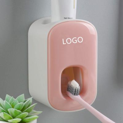 China Modern Toothpaste Dispenser Wall Mount for Bathroom Automatic Toothpaste Squeezer for Kids and Family Shower for sale