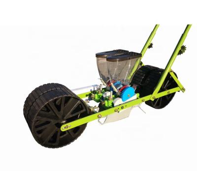 China Mini Portable Plastic Vegetable Seeder Easy Push Hand Hand Operation Seeder Two Rows Manual Seeder for sale