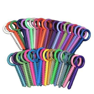 China Colorful Dental Ortodoncia Braces Elastic Ligature Ties Sticks Elastomeric for sale