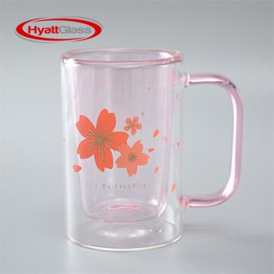 China Viable Transparent Double Wall Sakura-Printed Glass Coffee Mug With Handle for sale