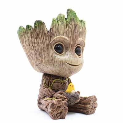 China Cute Model Toy Groot Pen Pot Christmas Groot Present Cartoon Toy Creative Baby Groot Flower Pot for sale