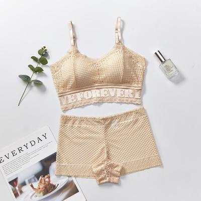 China New beautiful wrap QUICK DRY lace back chest hollowed out breathable two piece wireless bra women lace up bra sets for sale