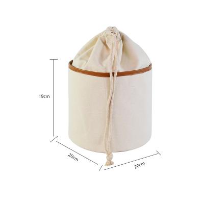 China Fashion Guangzhou factory wholesale canvas barrel shaped cosmetic storage drawstring bag for travel for sale