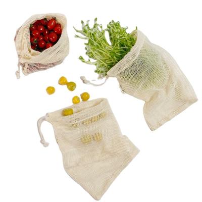 China 100% Eco-friendly Large Reusable Organic Cottons Mesh Bag Drawstring Net Mesh Bag For Fruits And Vegetables for sale