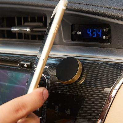 China Portable Universal Mini Wall Home Office In Car Steering Wheel Sticker Dashboard Car Mount Mini Magnetic Mobile Phone Mount for sale