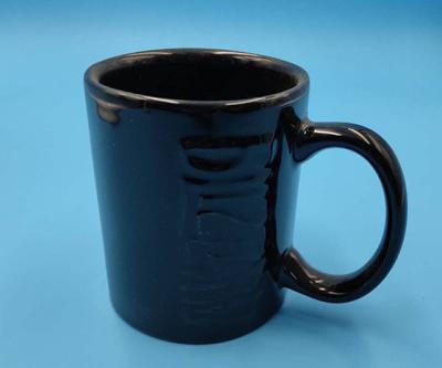 China Viable Cheap Promotion Gifts Embossed Effect 11oz Ceramic Coffee Mug for sale