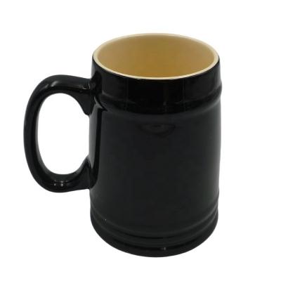 China Disposable Black Exterior Single and Yellow Interior Double Luster Beer Mug with Handle Ceramic Mug for sale