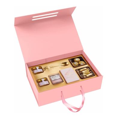 China Recyclable Luxury Heavy Duty Flat Pack Cardboard Folding Recyclable Luxury Heavy Duty Cardboard Folding Magnetic Flap Box Pink Gift Boxes With Ribbon Handle for sale