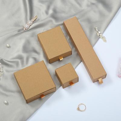 China Recyclable Custom Logo Brown Kraft Paper Jewelry Accessories Boxes Packaging Pearl Ring Necklace Earring Trinket Box for sale