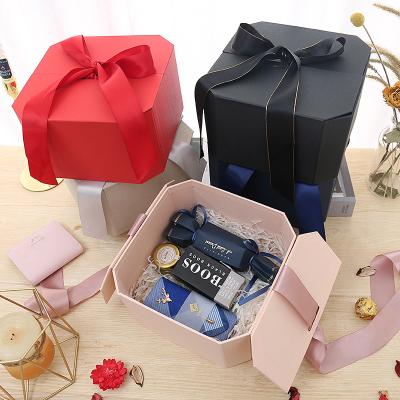 China Handmade Wholesale Decorative Luxury Valentine's Day Candy Wedding Octagon Sweet Gift Box With Ribbon Flower Gift Boxes for sale