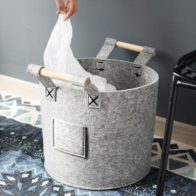 China Viable Storage Wooden Bucket Bedroom Felt Clothes Storage Portable Basket for sale