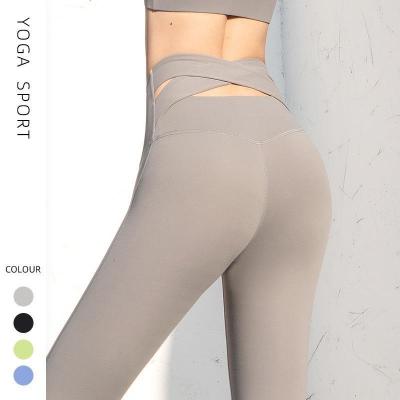 China Breathable have the current American hot-selling hip seamless knitted buttocks moisture yoga wicking pants sports fitness pants sexy hip female for sale