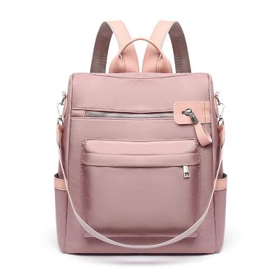 China Inventory Sale Large Capacity Cheap Cute Pink Backpacks College Waterproof Anti-theft Casual Backpack For Female Students for sale