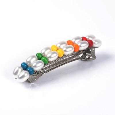 China Low MOQ Fashion Decoration Temperament Pearl Rainbow Color Pearl Hair Clips Barrette Bling Spring Rods Hair Accessories for sale