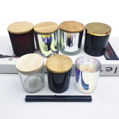 China Wholesale home decoration glass candle holder for home decoration customization frosted candle jars with wooden lids for sale