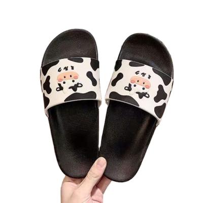 China Trend One Summer Cartoon Cow Women Anti-skid Slippers Soft Bottom Cool Word Slippers Home Bathroom Slippers for sale