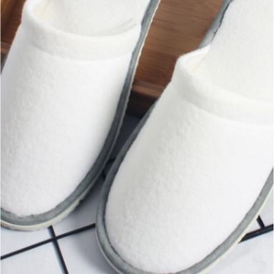 China Anti-odor Hotel Supplies Non-slip Disposable Slippers Thick Plush Hotel Slippers for sale