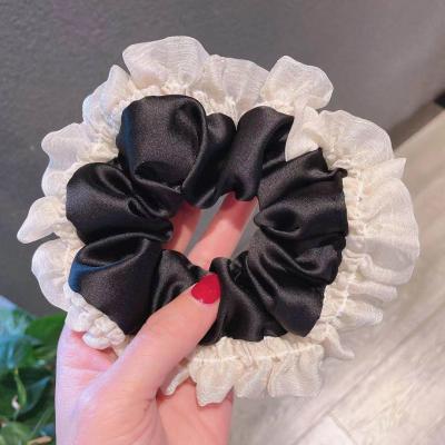 China Designer Korean Women High Quality Satin Lace Up Luxury Elastic Hair Tie Bands Girls Scrunchies Charms Black White Hair Scrunchies for sale