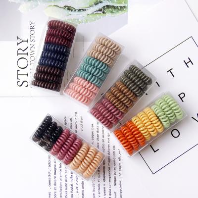 China TPU05 9Pcs Custom Colored Stretch Hair Ring Girls Elastic Telephone Wire Silicone Traceless Spiral Hair Ties Set Women for sale