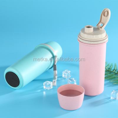 China Customized Sustainable Natural Biodegradable Wheat Straw Water Bottle BPA Free Plastic Coffee Mug With Collapsible Handle for sale