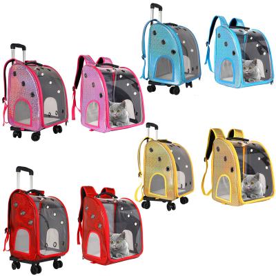 China Capsule Breathable Portable Pet Travel Carrier Backpack With Trolley Wheels Breathable Transparent Pet Carrier Bag For Dog Cat for sale