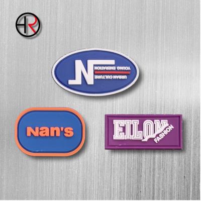 China Custom Brand Logo Emboss Smile And Love PVC 3D Silicone Patch Eco-friendly Rubber Label Washable for sale