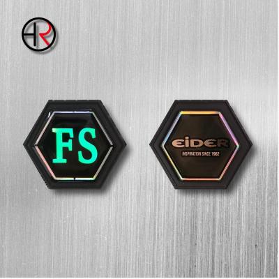 China Fashion Design Washable Custom Embossed 3D Brand Logo Plastic PVC Label Silicon Rubber Patches for sale