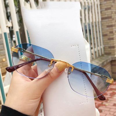 China 2022 Newest Comfort Fashion Sunglasses Frameless Mirror Sunglasses Women UV400 Square Frame Blue Polygon Male Sunglasses Retro for sale