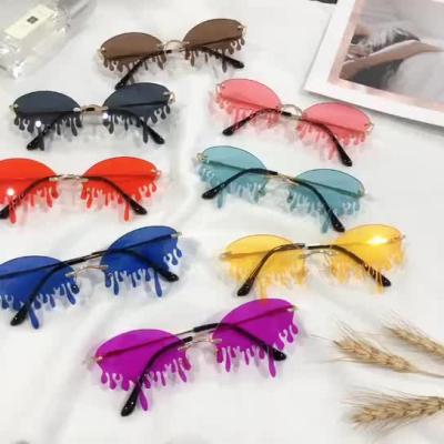 China Fashion sunglasses 2022 new fashion style rimless colorful water droplets shape dazzling sunglasses women's sunglasses for sale