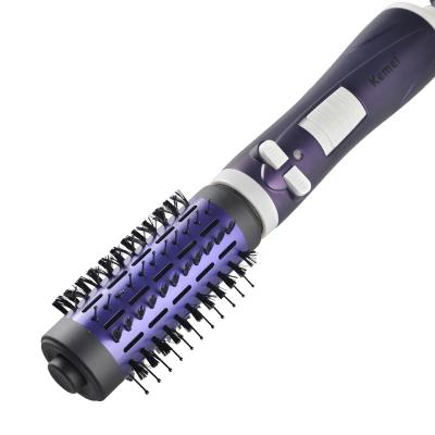 China Security Kemei KM-813 cheap customized new magic hair curler with comb hair curling iron with brush wholesale for sale