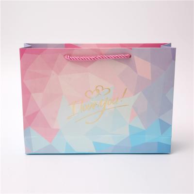 China Recyclable Competitive Price Custom Paper Gift Bags Luxury Paper Bags With Your Own Logo for sale