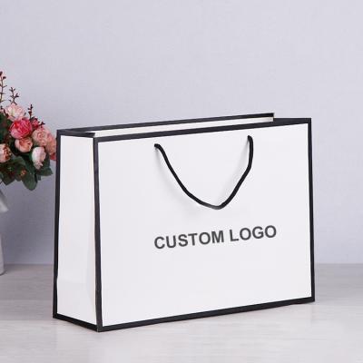 China Fashion Recyclable Custom Fancy Design Matt Lamination Paper Gift Bags Hard Paper Bag for sale