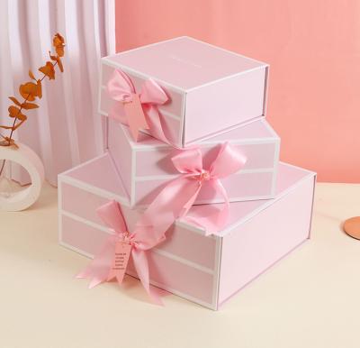 China Handmade Cardboard Packaging Hot-Wholesale Luxury Gift Box With Pink Bowknot for sale