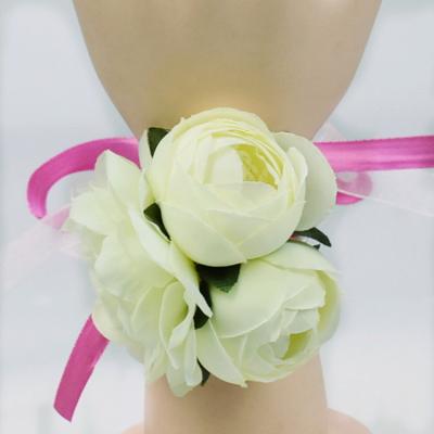 China Factory direct sale popular wedding supplies brides and bridesmaids wrist flowers / garland /bracelet for sale