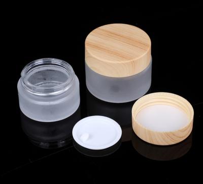 China Empty cosmetic packaging 5g 10g 20g 30g 50g 100g cosmetic cream jar cream packaging with wooden grain plastic cap for sale