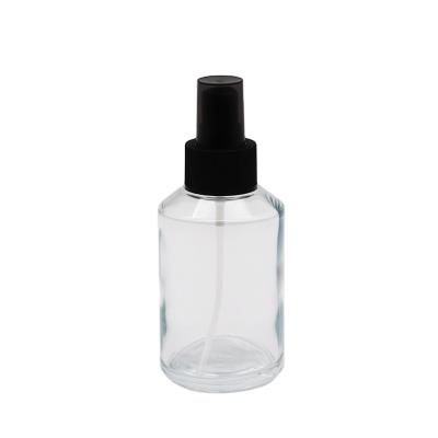 China Travel Tilted Shoulder 15ml 30ml 60ml 100ml 120ml Personal Care Frosted Black Cosmetic Perfume Glass Bottle With Pump Sprayer For Skin Cream for sale