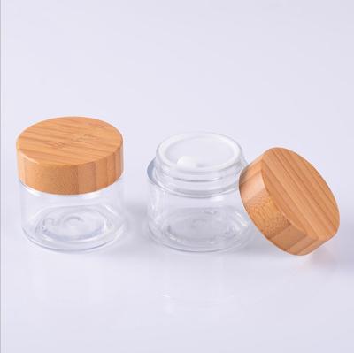 China PET Material 50ml 100ml 250ml Amber Plastic Jar 1oz Empty Clear Face Hair Cream Cosmetic Packaging 50g Jar Container With Bamboo Cap Lid for sale