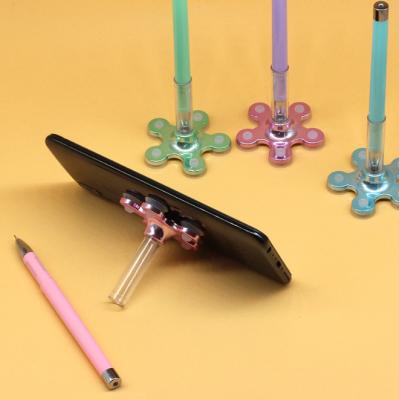 China Normal logo VIP logo silicone suction cup holder pen flower shape mobile phone holder for sale