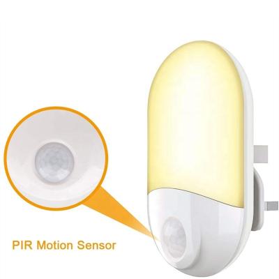 China Modern Light Wireless Automatic Night Light PIR Motion Sensor 90-260v Plug In EU USA UK LED Kids Night Light for sale