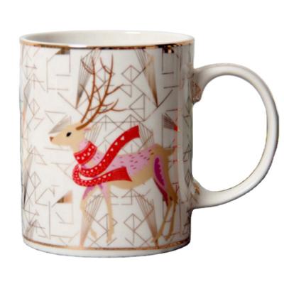 China Viable Hot Selling Porcelain Mug Coffee Mugs Gold Rim Deer Imprint Design Sublimation 15oz Mug For Christmas Gifts for sale