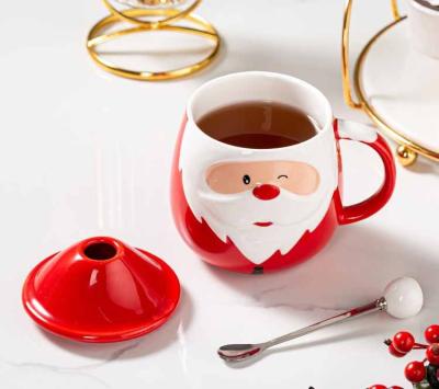 China Christmas Themed Ceramic Coffee Mugs Viable With Lid And Spoon SUS304 Handcraft Santa Design Beverage Cup For Drinking for sale