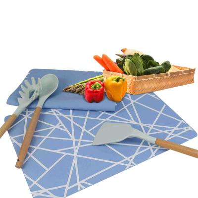 China Viable Reusable Food Grade Non-slip Silicone Drop Water Protection Table Leather Place Mat For Home for sale