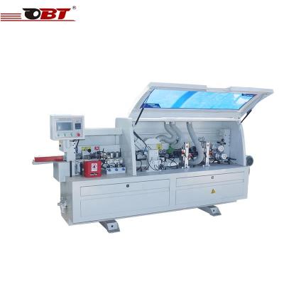 China Fully Automatic Factory Best Glue Pot Trimming Solid Wood Edging Machine for sale