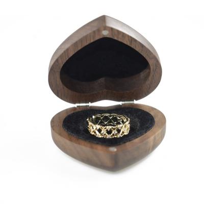 China 2022 China Unique Custom Made Natural Solid Walnut Wood Heart Shape Solid Wedding Ring Box for sale