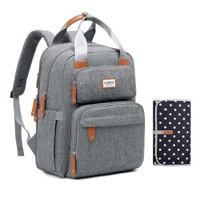 China Anti-theft Large Baby Diaper Diaper Bag Wet Bag Backpack With Changing Station for sale